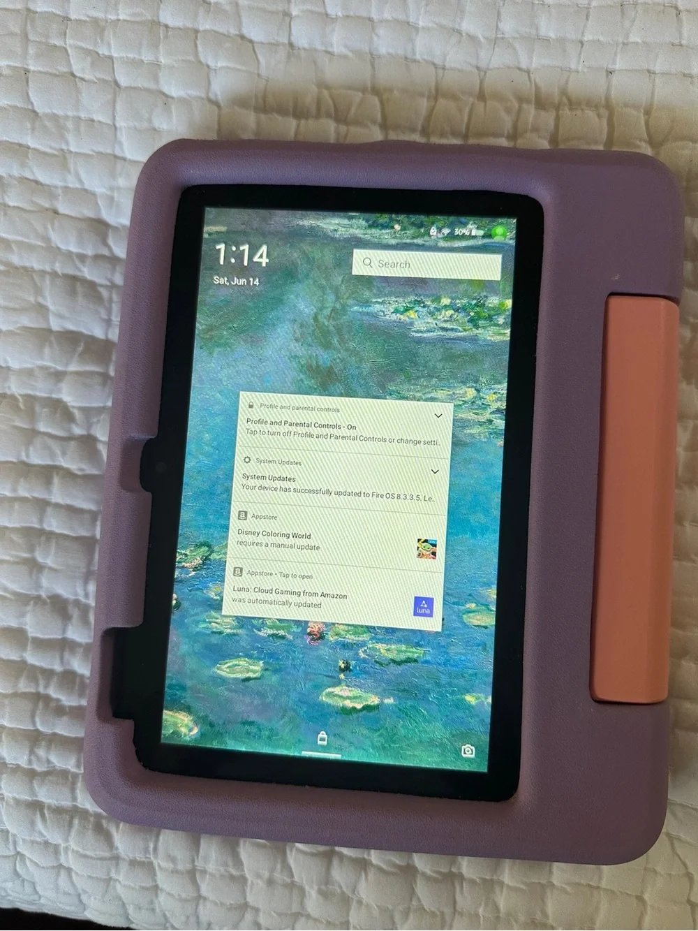 Kid-Friendly Purple Tablet with Pink Handle - Amazon